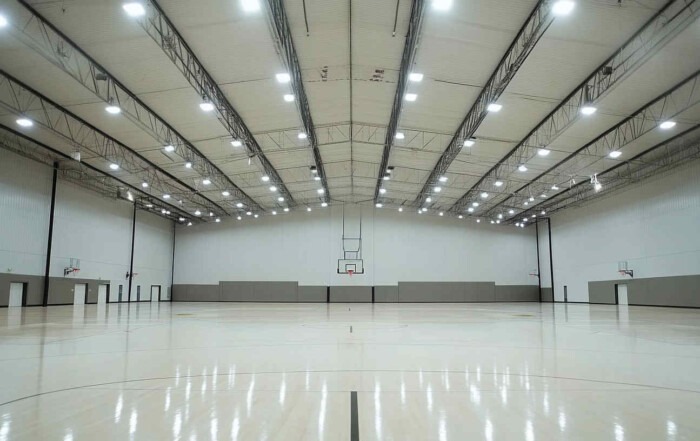 A_modern_indoor_basketball_court_illuminated_with_high bay LED light